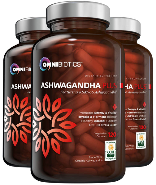 A bundle of three bottles of OmniBiotics Ashwagandha Plus dietary supplement, with the main bottle displaying the product name and a graphic of ashwagandha roots, flanked by two additional bottles with more product details.