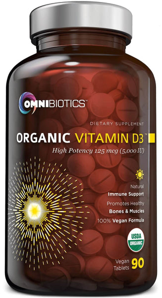 A bottle of OmniBiotics Organic Vitamin D3 supplement with high potency 5000 IU, labeled as vegan and gluten-free.