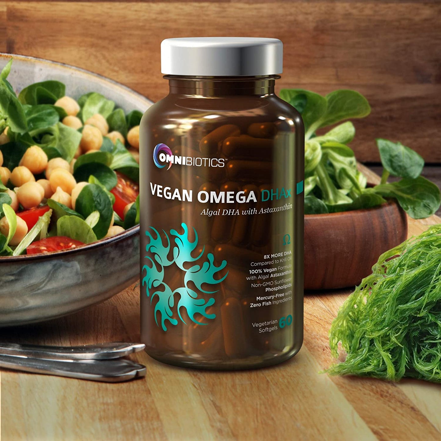 OmniBiotics Vegan Omega DHAx bottle beside salad and seaweed.